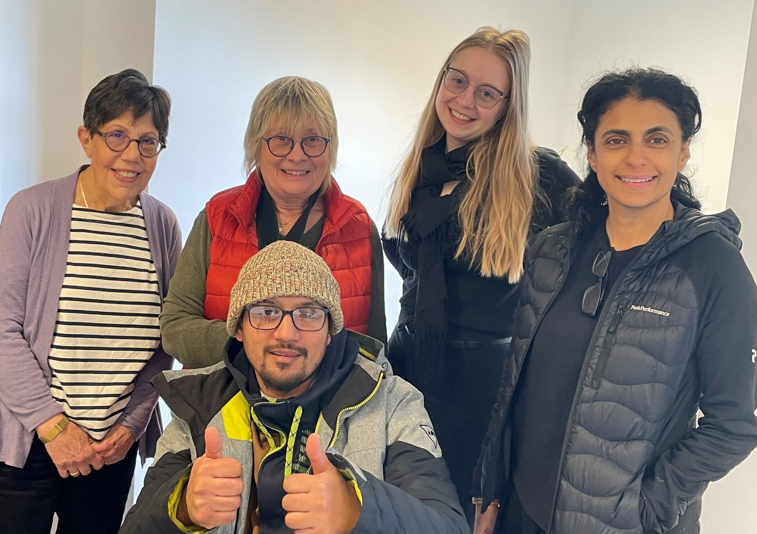 Vision Care for Homeless People volunteers, back row, left to right: Debra Farbey; Jane Partridge, CLO; Penny Ardley FBDO and Tazeen Haider, optometrist. Front row: client Sahid Uddin