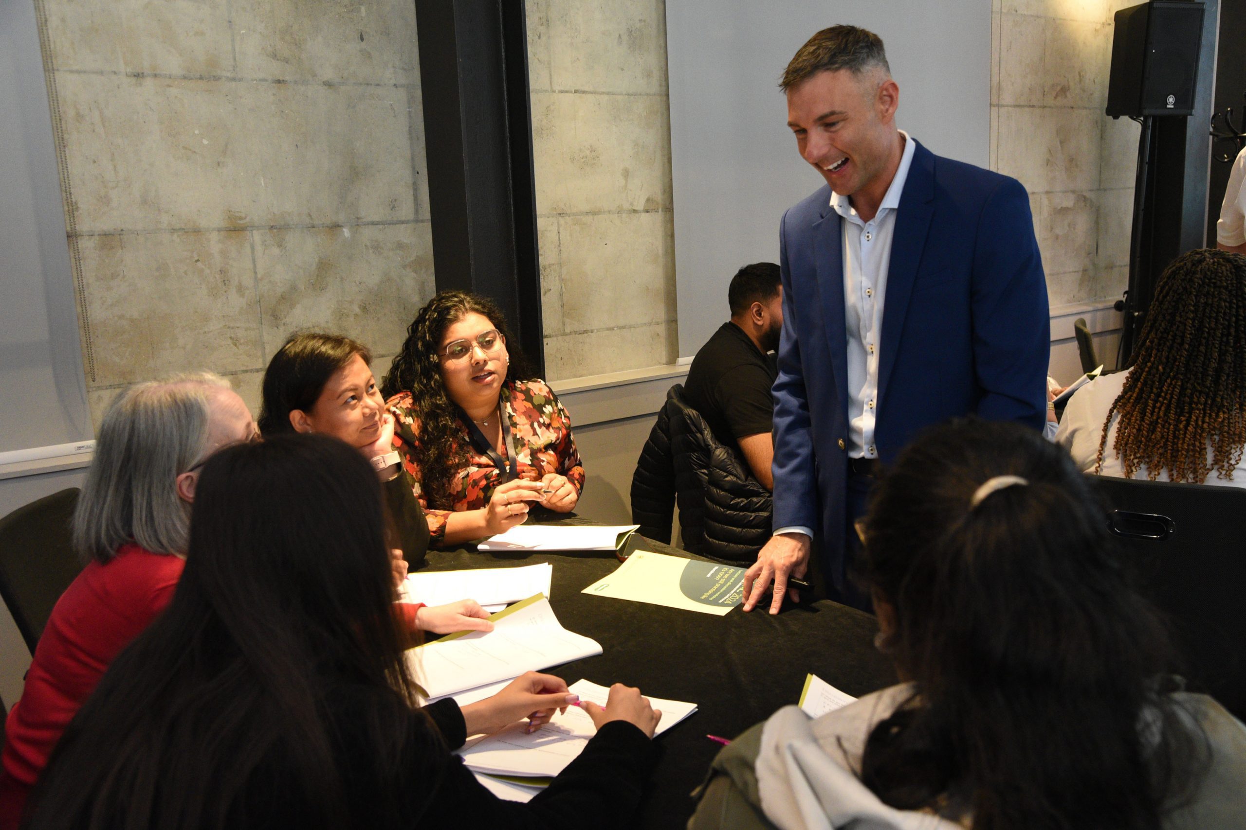 Neil Retallic, head of professional development, at a Specsavers event